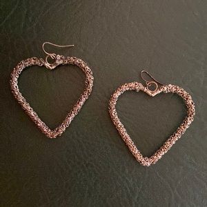 Silver heart shaped dangle earrings